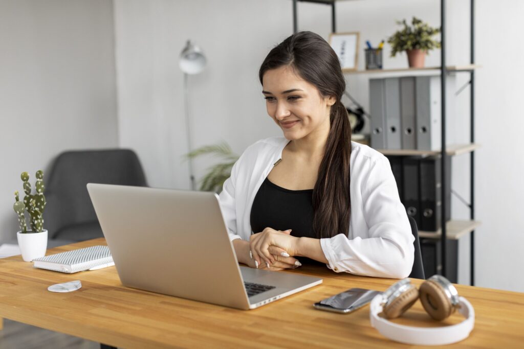 medium-shot-smiley-woman-doing-work-min-scaled.jpg